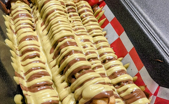 Loaded patacones with drizzles